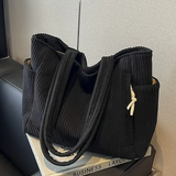 Matilda – Bolsa de mano acanalada con detalle de cordón