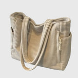 Matilda – Bolsa de mano acanalada con detalle de cordón