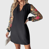 René | Elegante vestido corto con escote en V y mangas transparentes