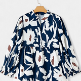 Filomena Blusa con Media Botonadura y Manga Abullonada en Estampado Floral Abstracto